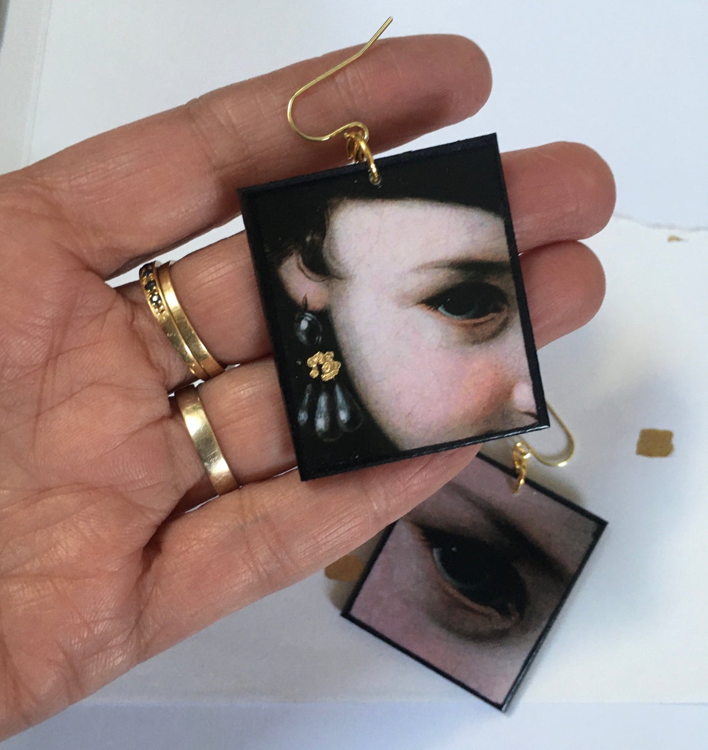 Sustainable wood earrings with eyes details inspired by the Italian Baroque artist Pietro Antonio Rotari and his painting‘Girl with a Book’
