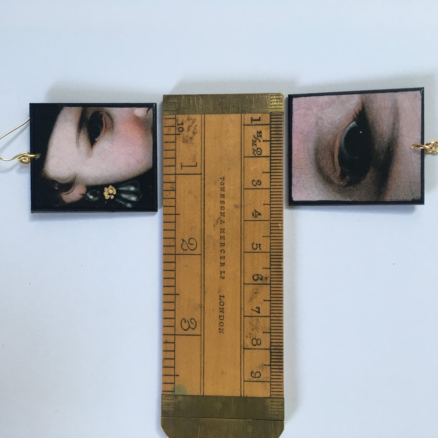 Sustainable wood earrings with eyes details inspired by the Italian Baroque artist Pietro Antonio Rotari and his painting‘Girl with a Book’