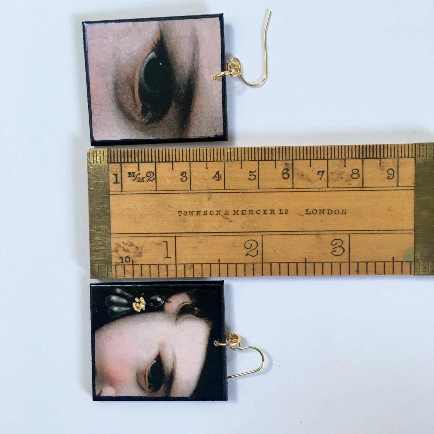 Sustainable wood earrings with eyes details inspired by the Italian Baroque artist Pietro Antonio Rotari and his painting‘Girl with a Book’