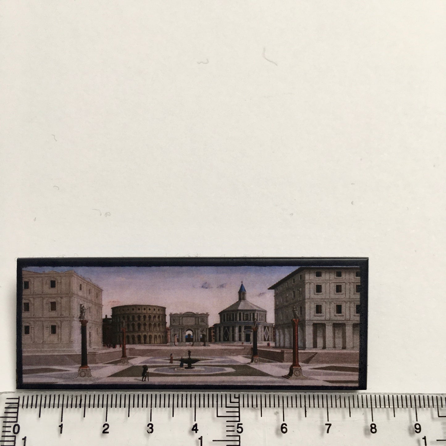 The IdealCity of Urbino, Berlin and Baltimore brooches