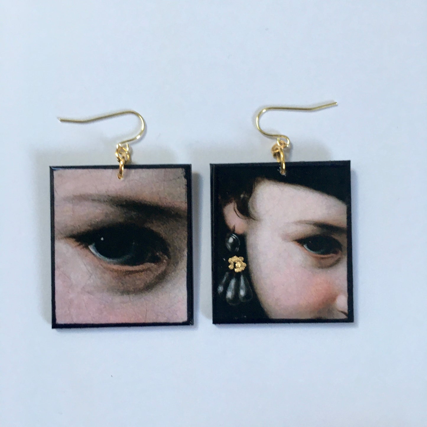 Sustainable wood earrings with eyes details inspired by the Italian Baroque artist Pietro Antonio Rotari and his painting‘Girl with a Book’