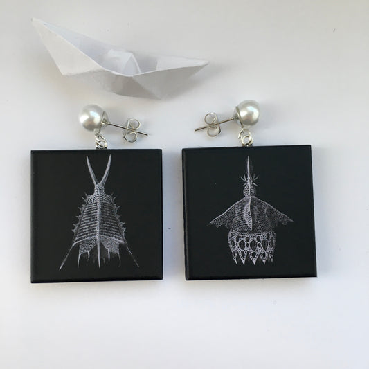 Sustainable wood earrings with stud pearls inspired by Ernst Haeckel marine shells, radiolaria black and white illustration. These earrings are completely handmade by Obljewellery