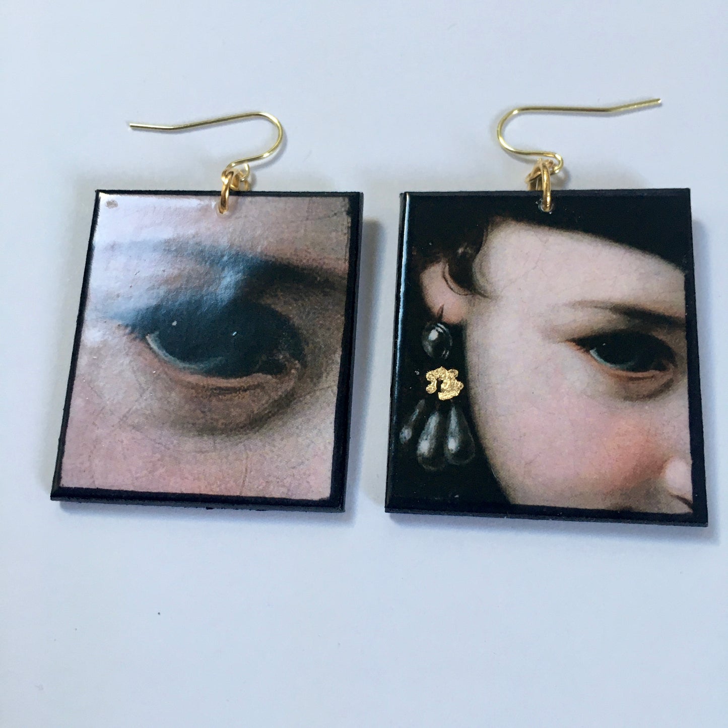 Sustainable wood earrings with eyes details inspired by the Italian Baroque artist Pietro Antonio Rotari and his painting‘Girl with a Book’