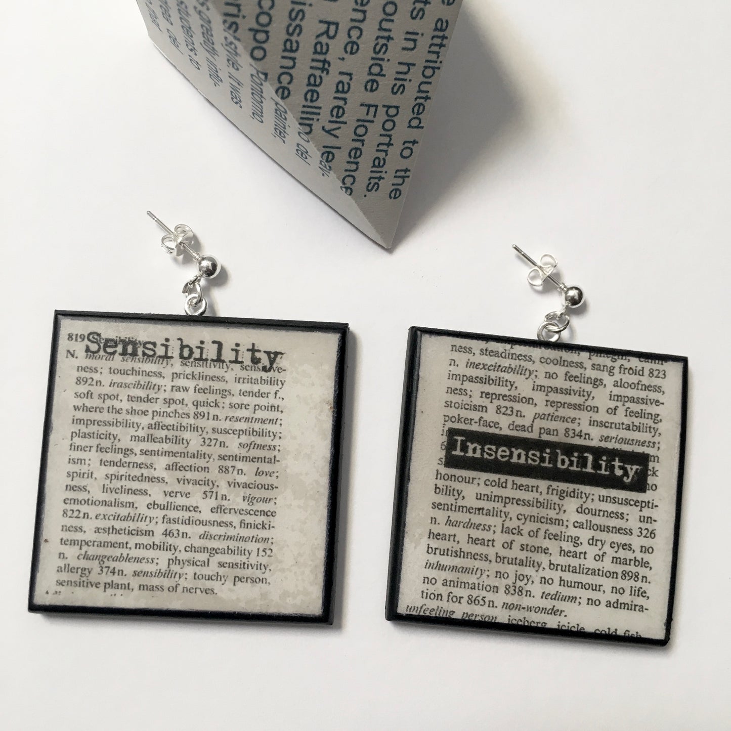 Museum-Inspired Sustainable Earrings Thesaurus book page earrings Obljewellery