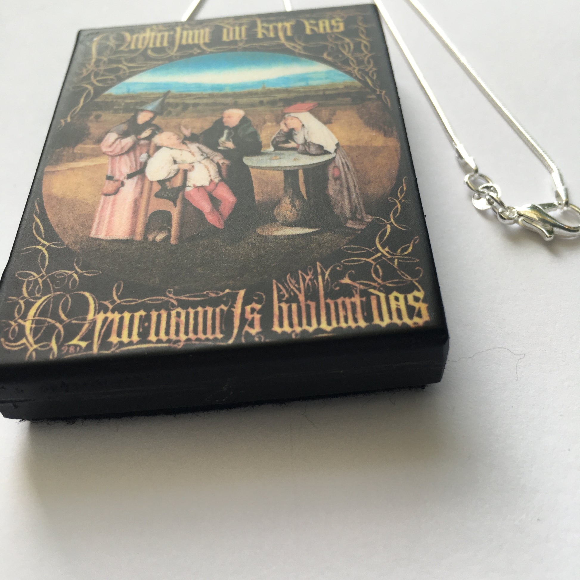 Museum-Inspired Sustainable Necklace Hieronymus Bosch, Cutting the Stone necklace Obljewellery