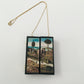 Triptych miniature art necklace handmade from sustainable wood reproduce The Haywain painting by Hieronymus Bosch. This aesthetic fully functioning art pendant necklace is created and designed by Obljewellery