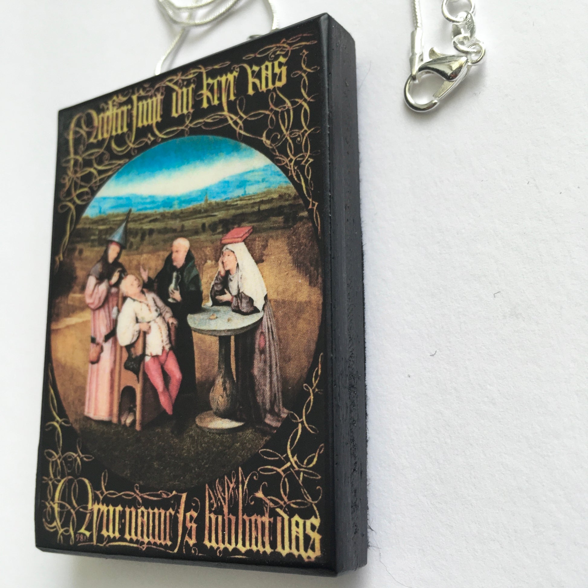 Museum-Inspired Sustainable Necklace Hieronymus Bosch, Cutting the Stone necklace Obljewellery