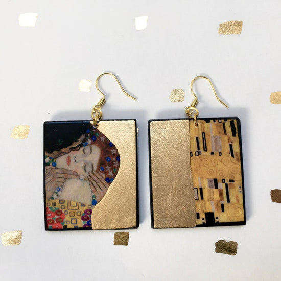Statement earrings inspired by Klimt's painting “The Kiss”.  The rectangular wooden earrings with gold leaf details are part of our statements art inspired earrings collection.  obljewellery.com
