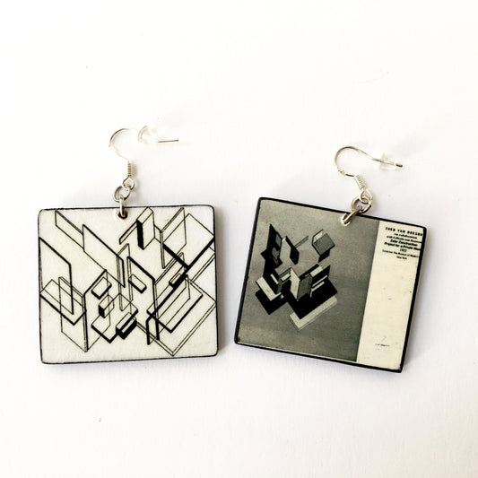 Mismatched, architectonic earring inspired by Theo Van Doesburg, De Stijl style with black and white geometric architecture planes.  Obljewellery sustainable wood earrings