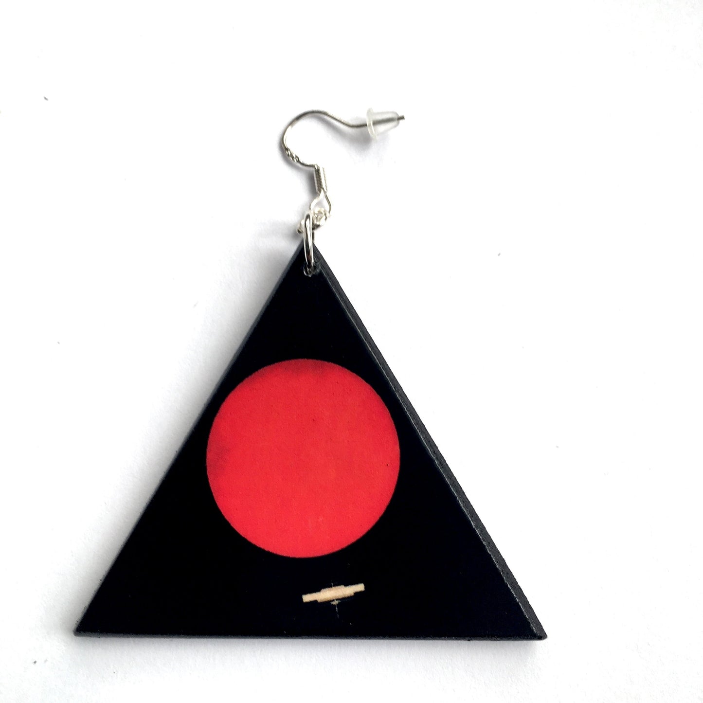 Triangular earring on sustainable wood and sterling silver hook. Color red circle on the black base. Obljewellery collection