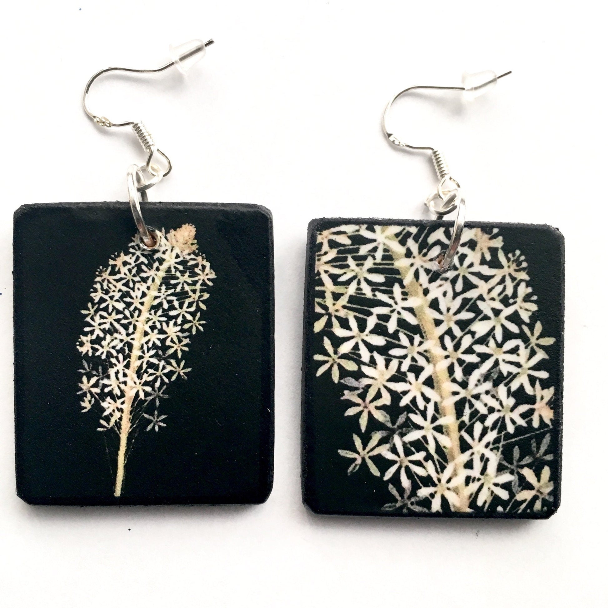 Obljewellery sustainable art earrings. These aesthetic earrings are on wood in black and white flowers  a botanical artwork by Mary Delany. The earings are an artsy gift for her.