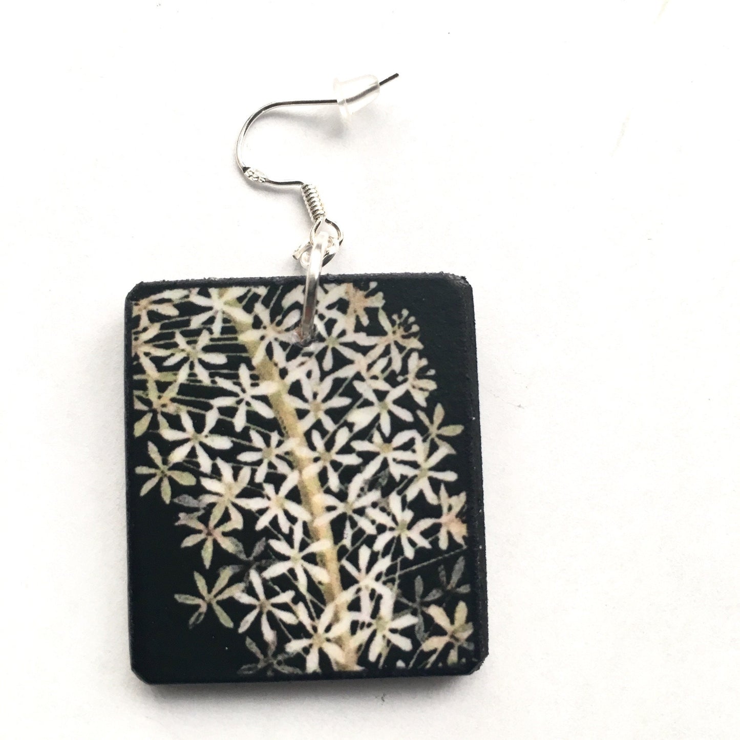 Obljewellery sustainable art earrings. These aesthetic earrings are on wood in black and white flowers  a botanical artwork by Mary Delany. The earings are an artsy gift for her.
