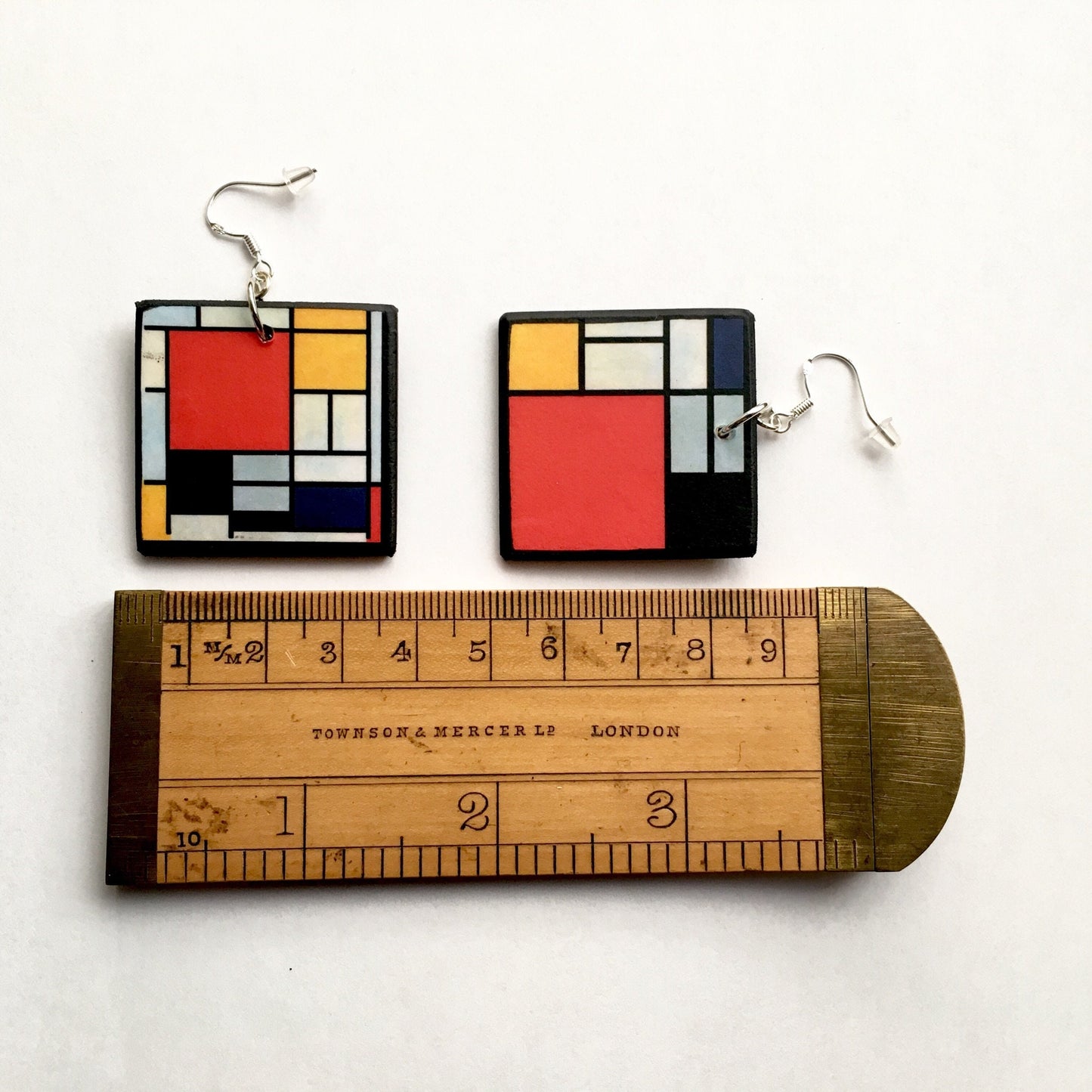 Museum-Inspired Sustainable Earrings Mismatched earrings inspired by Mondrian. Obljewellery