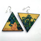 Van Gogh triangular, asymmetrical and mismatched earrings with a detail of the painting Vase with Irises against a Yellow Background. these earrings are made  with sustainable wood.