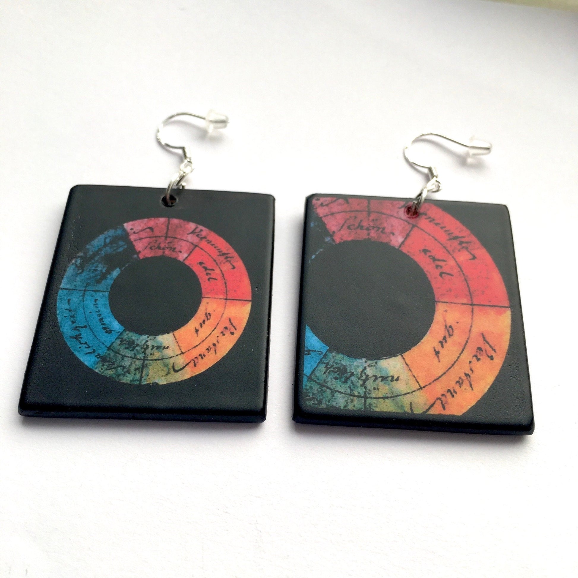 Color wheel designed by Goethe in 1809 inspired Obljewellery for these mismatched earrings.