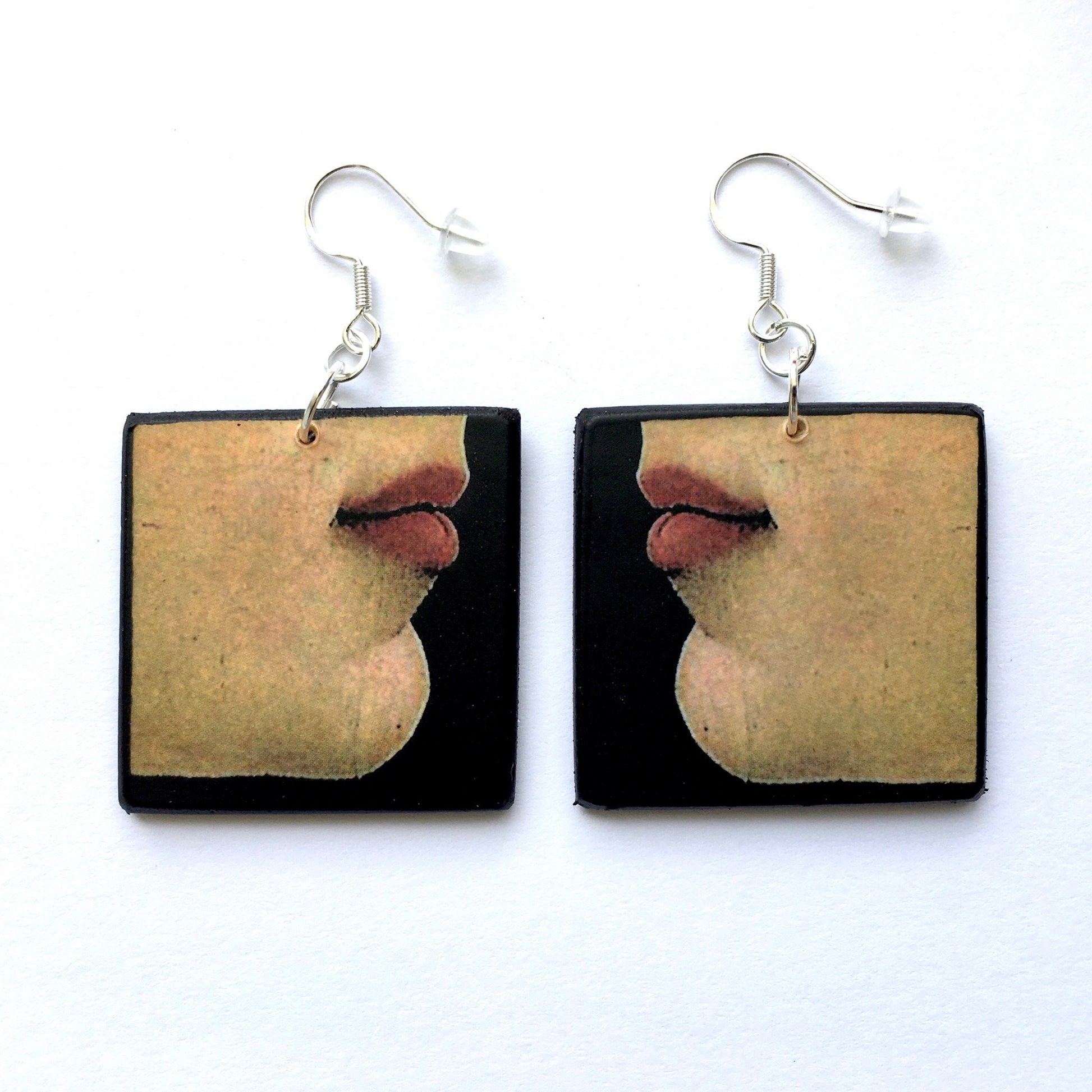 Unusual earrings on wood with a lip art detail painting of Young Woman Renaissance painting by Botticelli. These mismatched art earrings are handmade on sustainable wood.