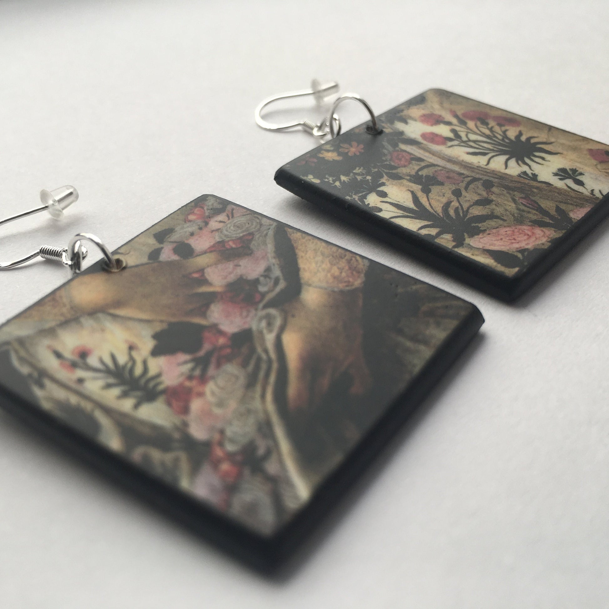Botticelli, Spring Renaissance painting detail on top of these sustainable wood earrings with sterling silver hooks. Mismatched, aesthetic earrings, professionally handmade for the perfect romantic anniversary earrings gift. 