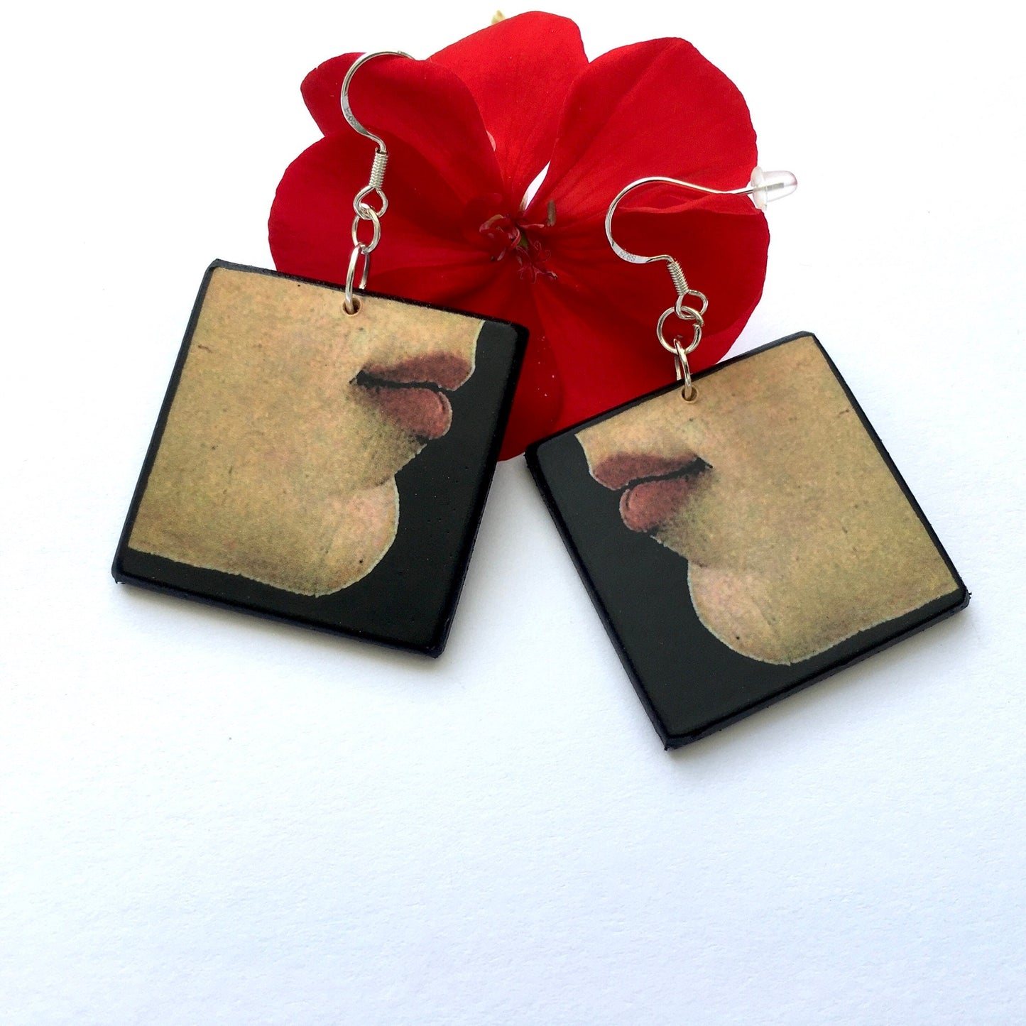 Unusual earrings on wood with a lip art detail painting of Young Woman Renaissance painting by Botticelli. These mismatched art earrings are handmade on sustainable wood.