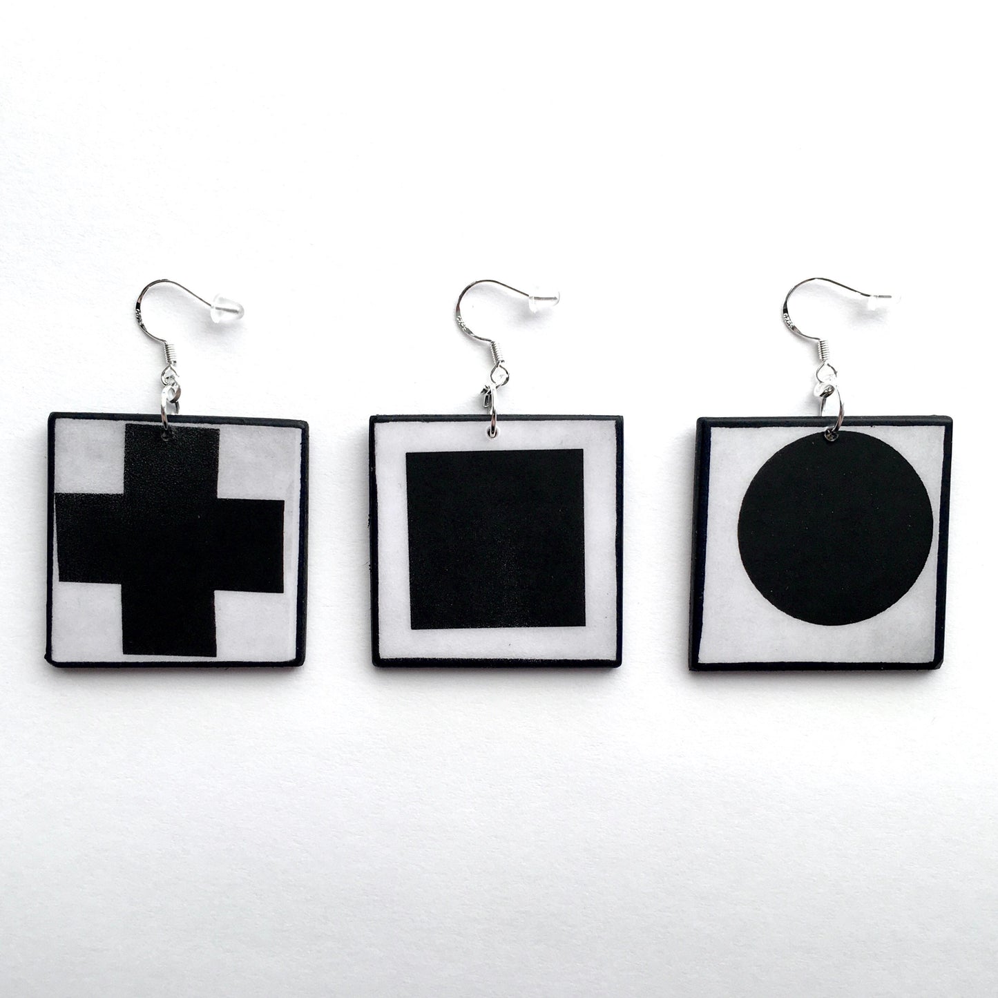 Geometric, abstract, statement art earrings inspired Obljewellery by Kazimir Malevich and his paintings in Suprematism style. Black Cross, Black Circle and Black Square