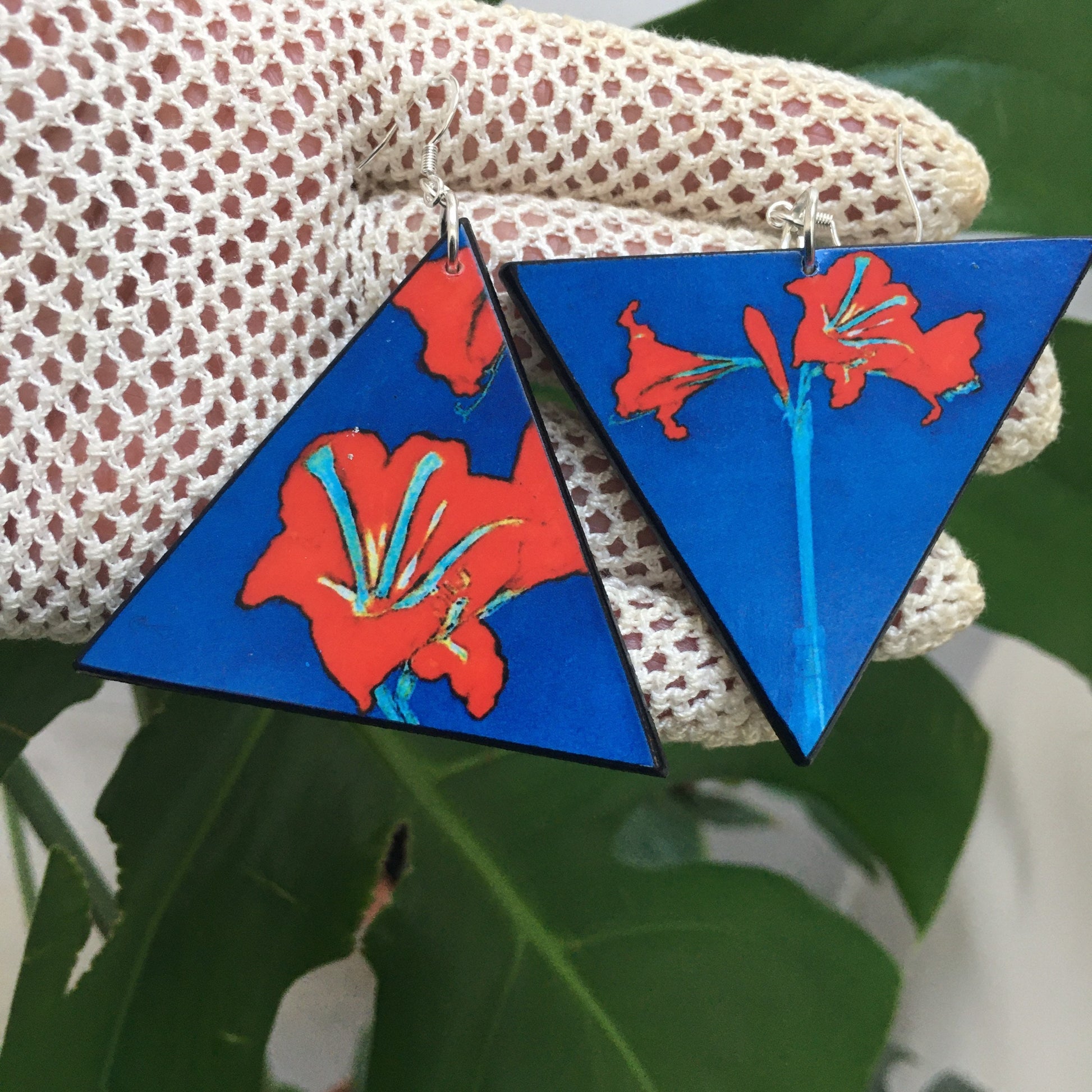 Mismatched, asymmetrical, triangle earrings with a detail of painting in a Fauvist style,  Red Amaryllis with Blue Background, 1907 by Piet Mondrian, handmade by Obljewellery.