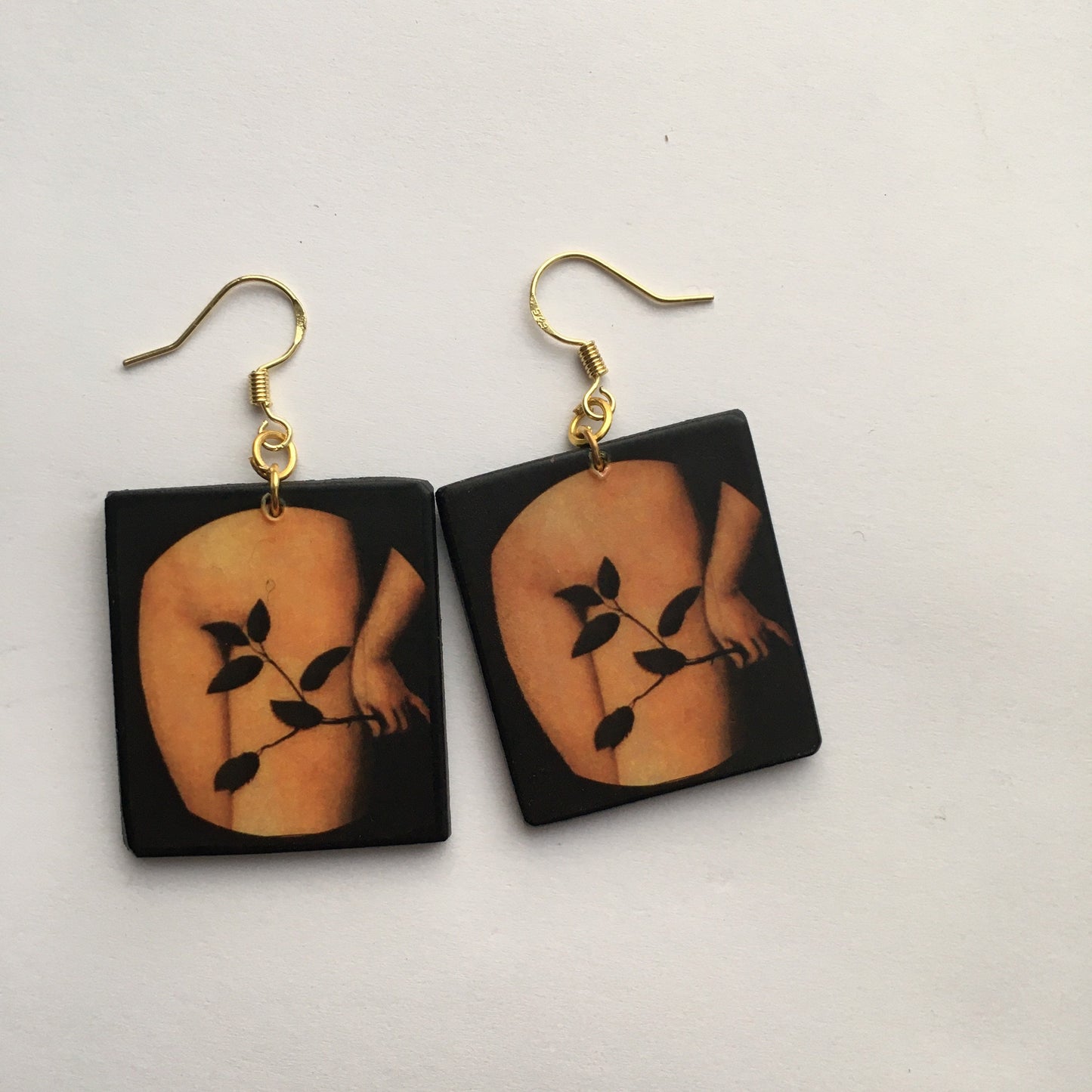 Sensual art earring inspired by Lucas Cranach.