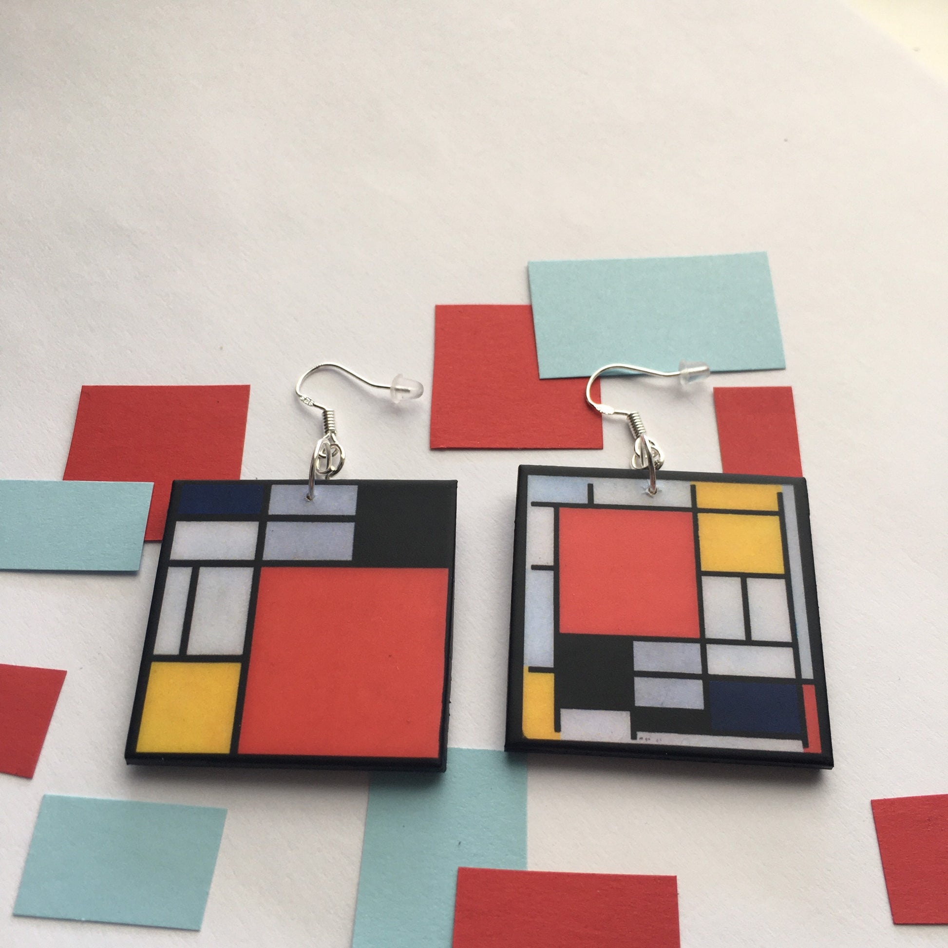 Museum-Inspired Sustainable Earrings Mismatched earrings inspired by Mondrian. Obljewellery