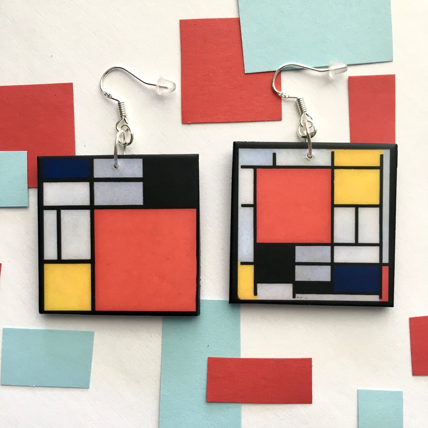 Mismatched earrings inspired by Mondrian.