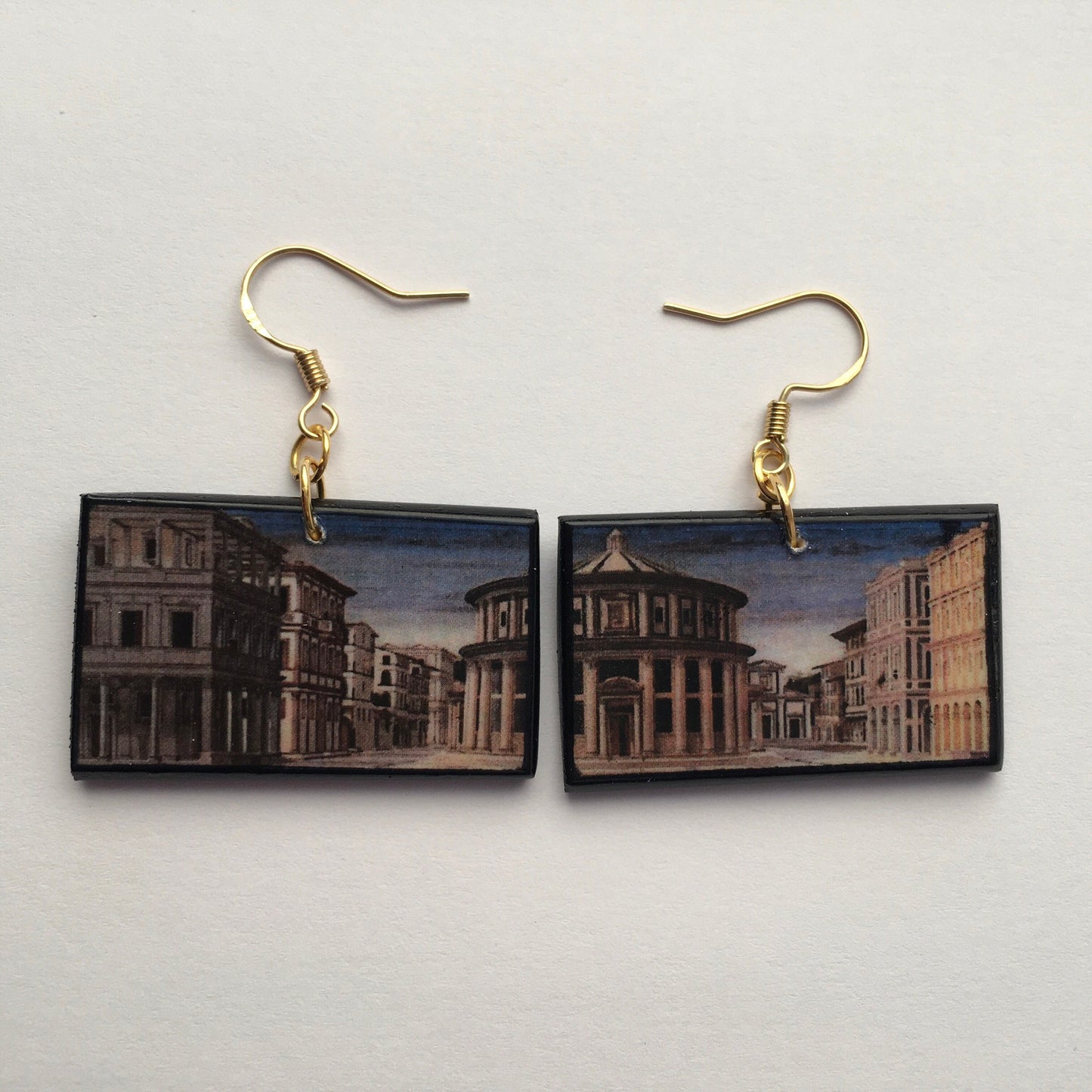 The Ideal City Urbino, statement, mismatched earrings with the prospective of the city. Renaissance art jewellery by Obljewellery on sustainable wood. Artsy, architect gift.