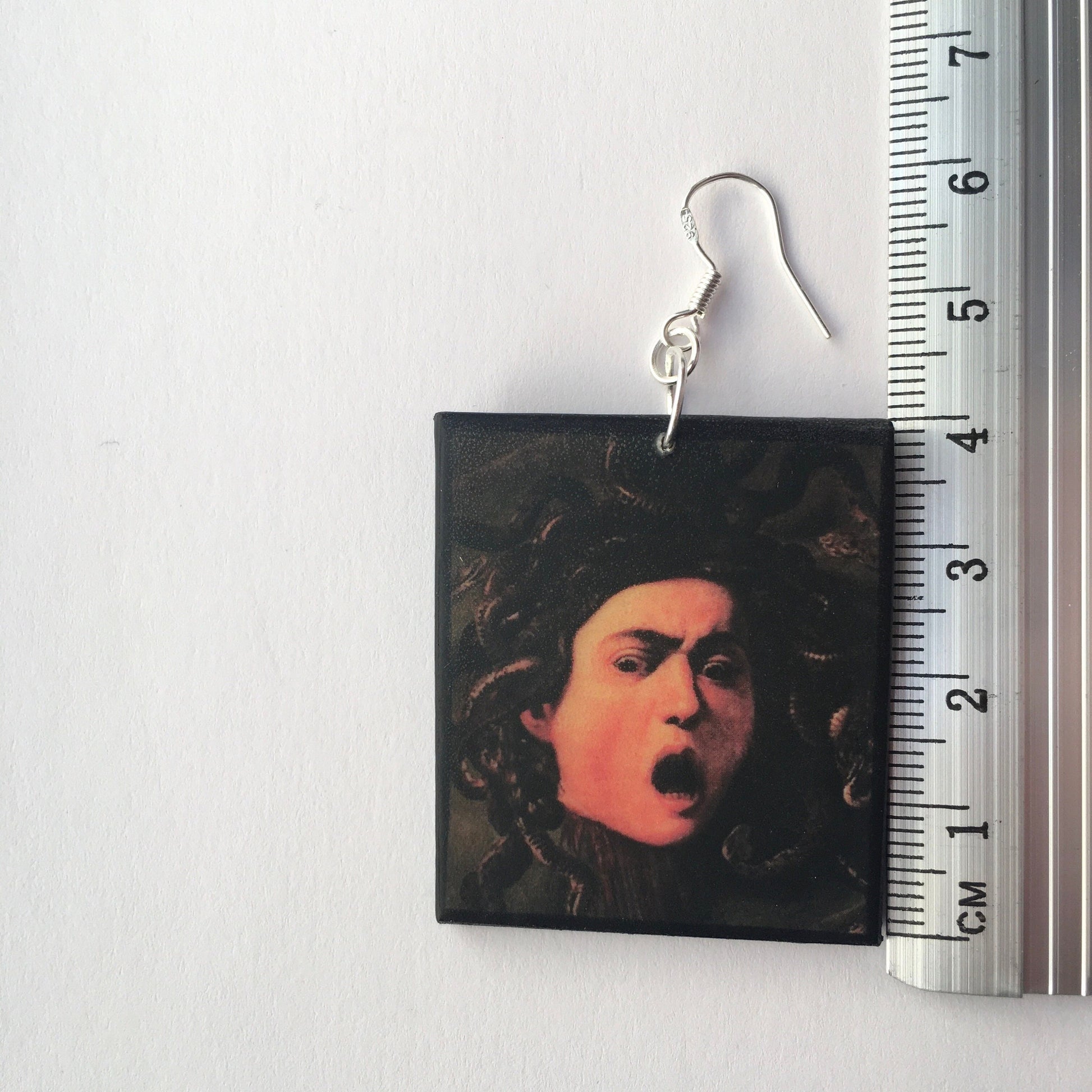 Medusa art earrings, impressive painting by Italian artist Caravaggio (Michelangelo Merisi). Lightweight wood, gothic style earrings with sterling silver hooks, completely handmade by obljewellery