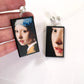 The girl with a pearl earring is a painting by Vermeer. These art details earring show the face of the girl they are in sustainable weood and have the stud earrings with pearls. Handmade mismatched earrings by Obljewellery