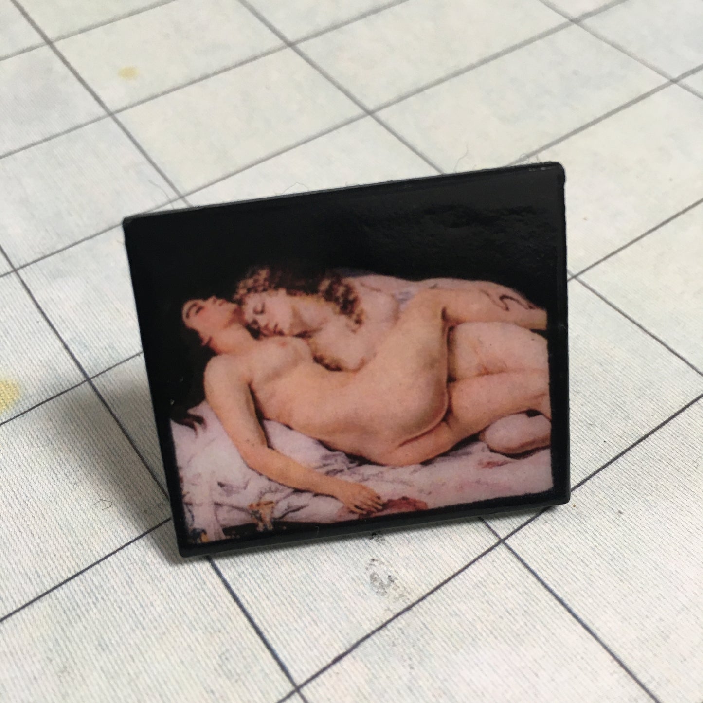 Sustainable, statement art ring inspired by Gustav Courbet and his sensual painting “Le Sommeil “ (The Sleeper). The band ring is in stainless steel and it’s adjustable. The statement part is handmade from sustainable wood. Sapphic artsy gift.
