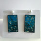 Stud pearls earrings with an art detail of the painting Almond Blossom by Vincent Van Gogh. These rectangular, turquoise background earrings are handmade from sustainable wood by Obljewellery.