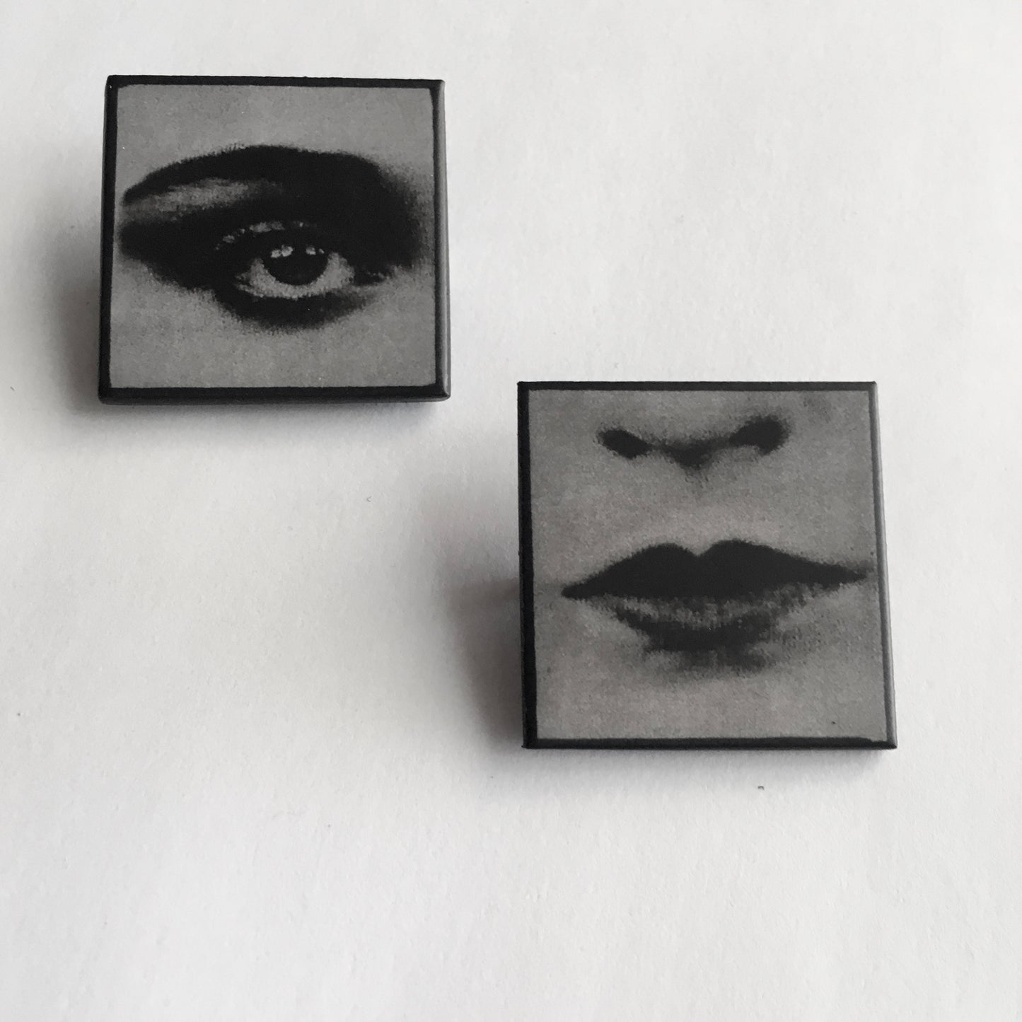 Set of two brooches, lips and eye